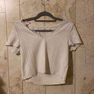 White shirt from Francesca’s with lace detailing.